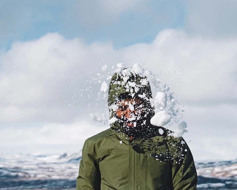 group of friends throwing snowballs at each other