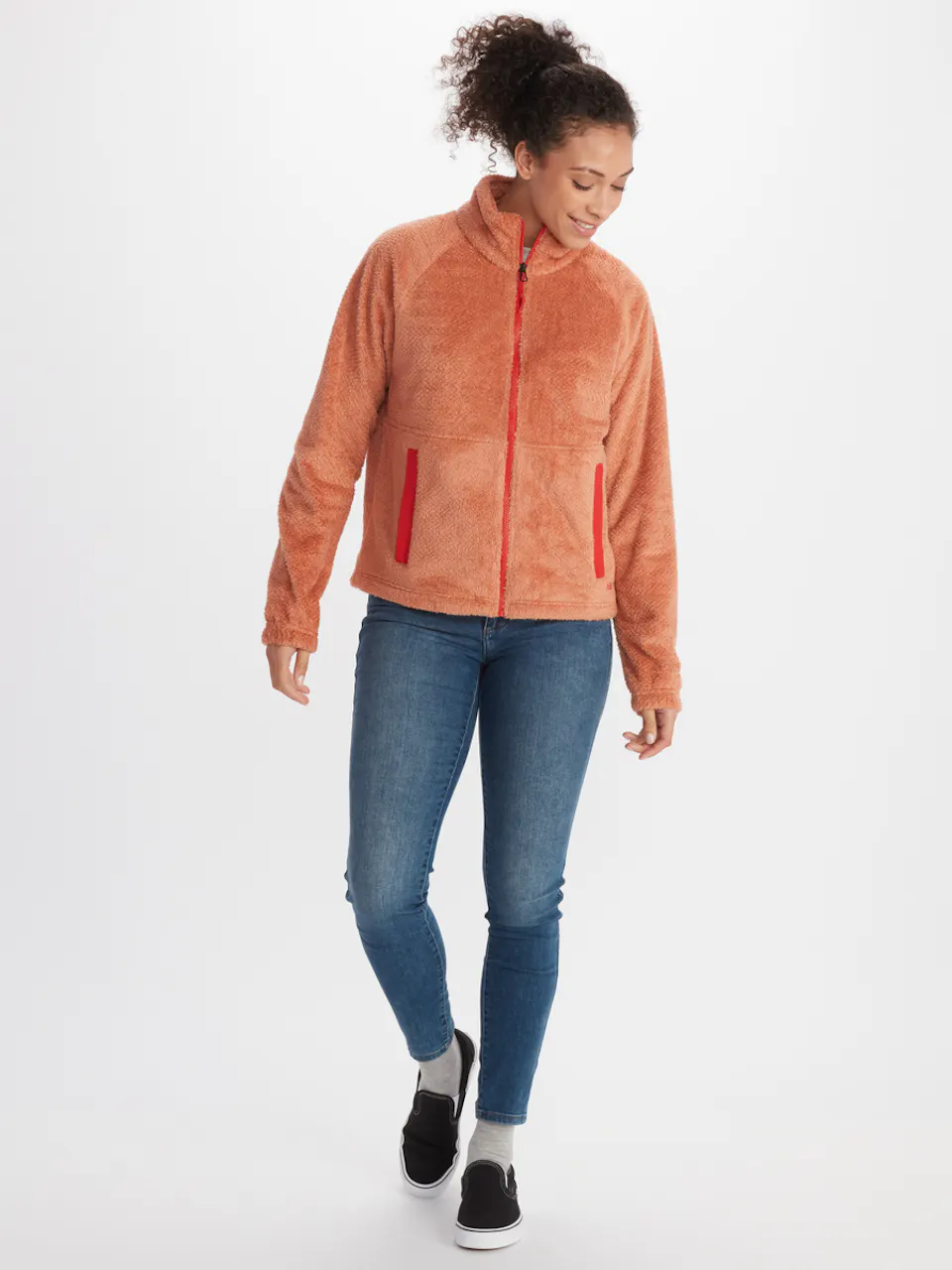 female model wearing assorted outdoor clothing for cold weather