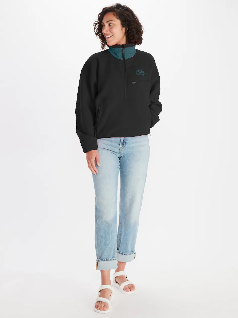 Woman in half zip fleece and jeans